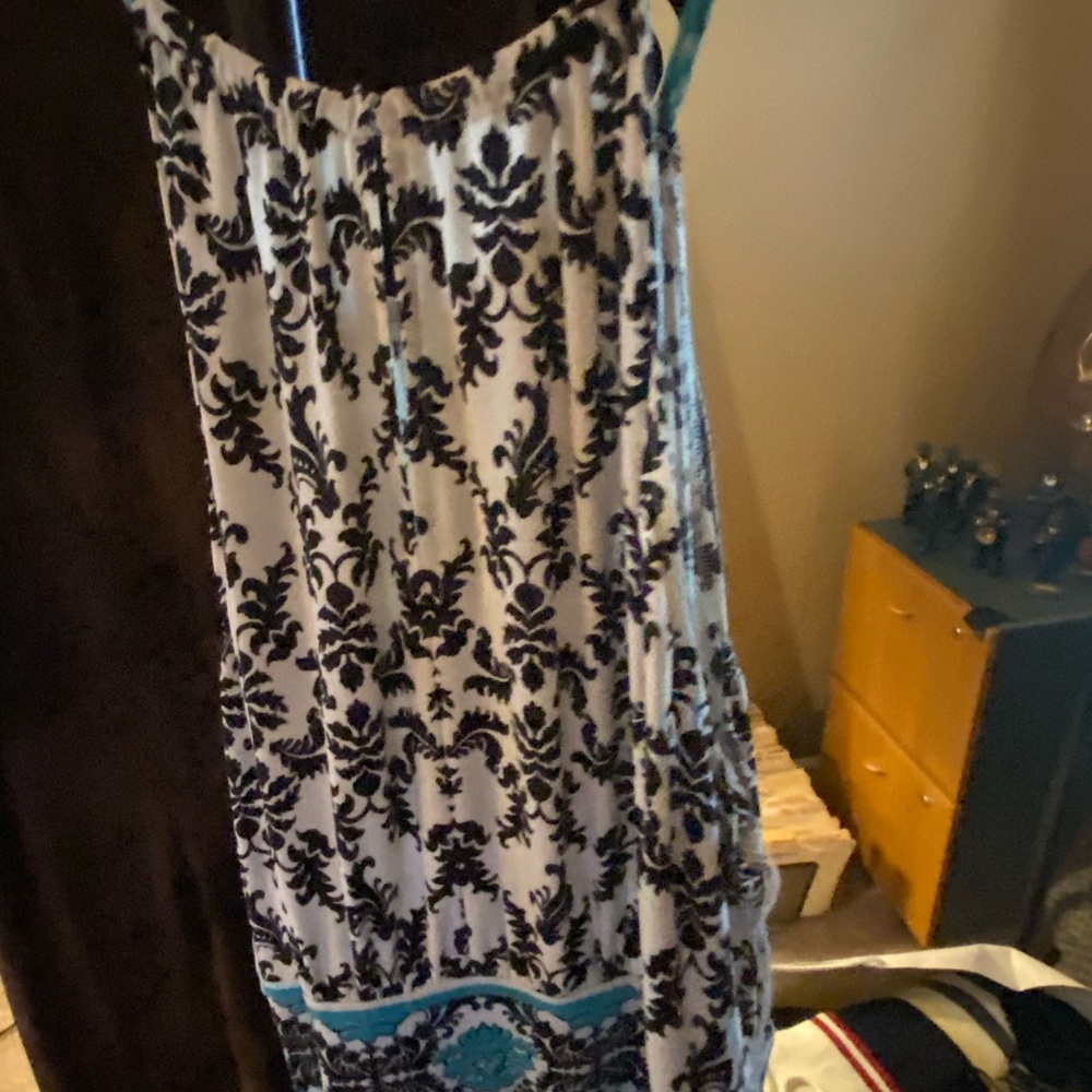 Black and White Patterned Dress with Teal Accents